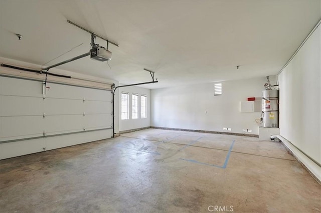 garage with water heater, baseboards, french doors, and a garage door opener