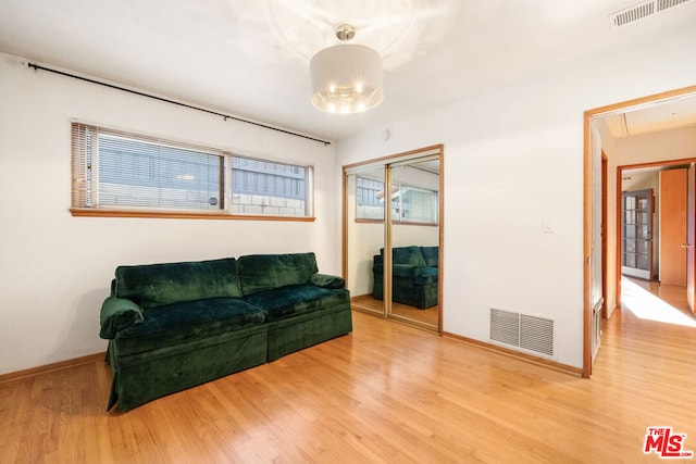 sitting room featuring hardwood / wood-style floors