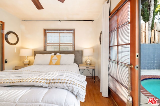 bedroom with ceiling fan, light hardwood / wood-style floors, and access to outside