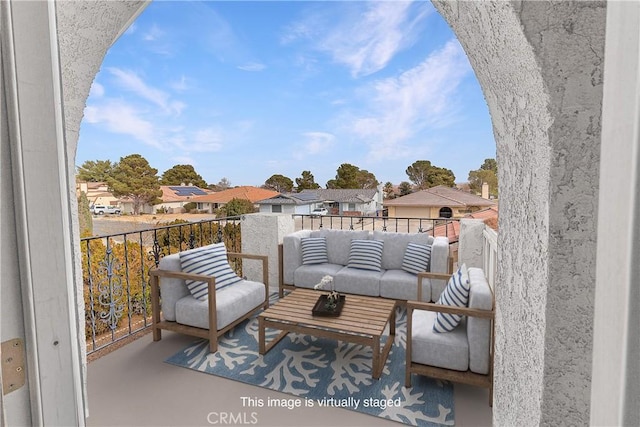 balcony featuring a residential view