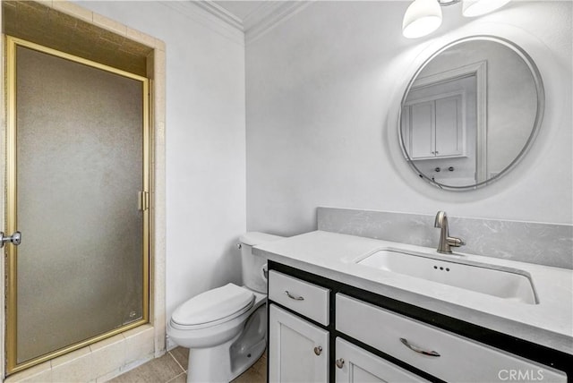 bathroom featuring tile patterned floors, crown molding, an enclosed shower, toilet, and vanity