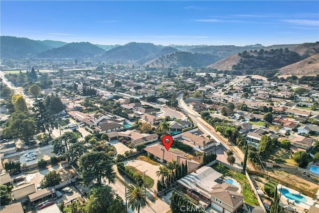 drone / aerial view featuring a mountain view