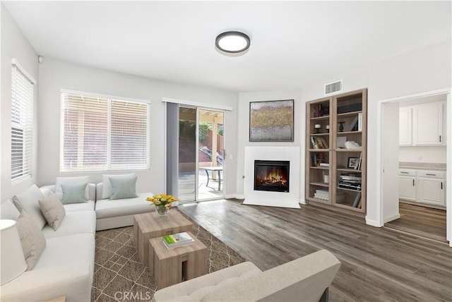 living room with dark hardwood / wood-style floors