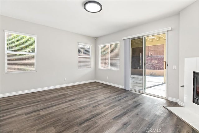 empty room featuring dark hardwood / wood-style floors