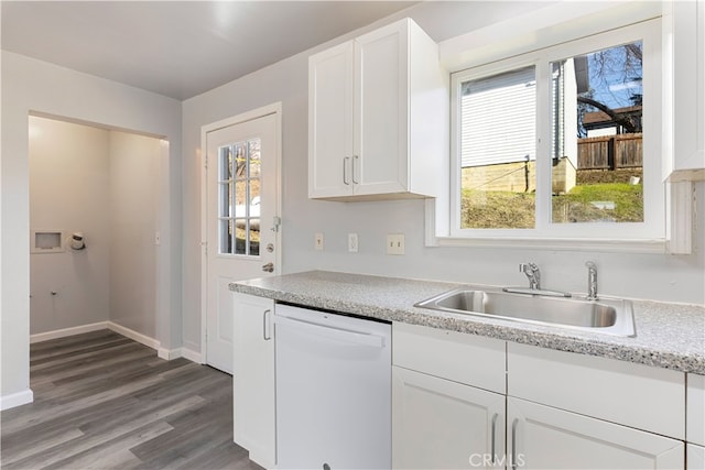 kitchen with wood-type flooring, dishwasher, white cabinets, and sink