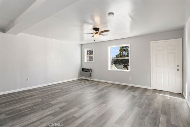 146 N Polk St, Lakeport, CA 95453 - unfurnished living room featuring ceiling fan, wood-type flooring, and heating unit