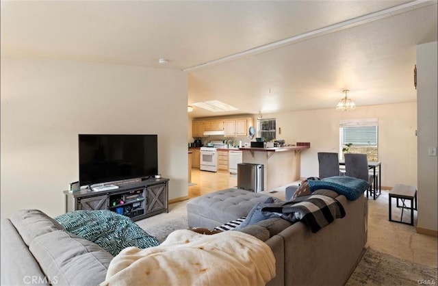 146 N Polk St, Lakeport, CA 95453 - living room featuring an inviting chandelier