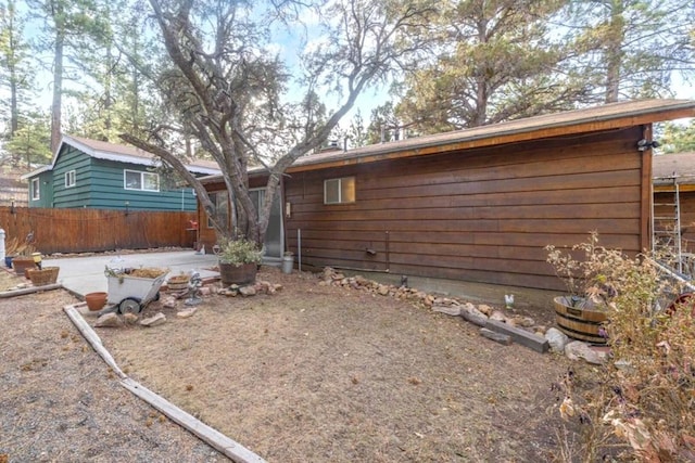 rear view of property featuring a patio area