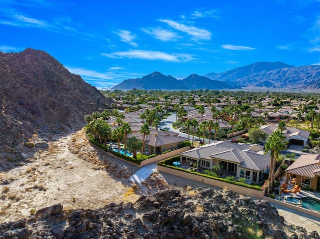 drone / aerial view featuring a mountain view