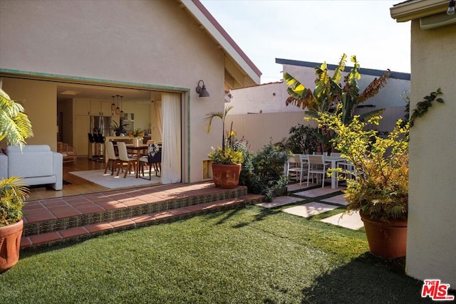 view of yard with a patio area