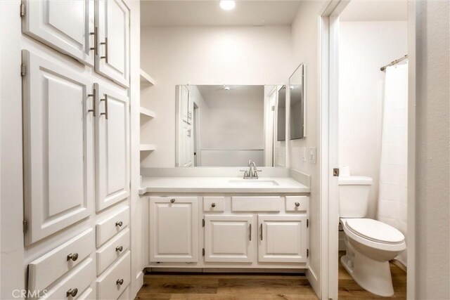 750 Chorro St Unit 5, San Luis Obispo, CA 93401 - bathroom featuring vanity, toilet, wood finished floors, a shower with curtain, and recessed lighting