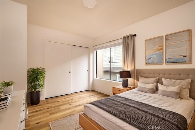 750 Chorro St Unit 5, San Luis Obispo, CA 93401 - bedroom with light wood-style flooring, a closet, and baseboards
