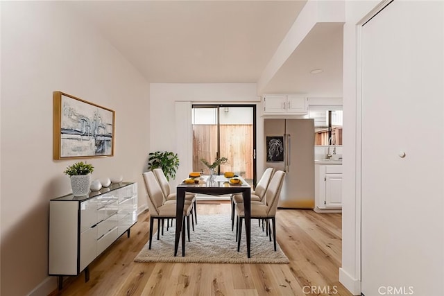 750 Chorro St Unit 5, San Luis Obispo, CA 93401 - dining space with light wood finished floors and baseboards