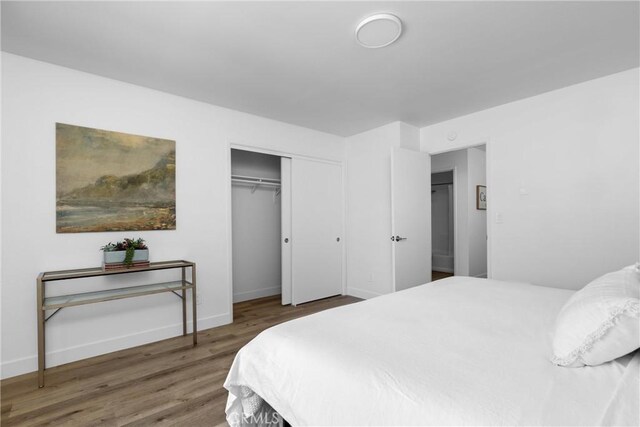 750 Chorro St Unit 5, San Luis Obispo, CA 93401 - bedroom featuring wood finished floors, baseboards, and a closet