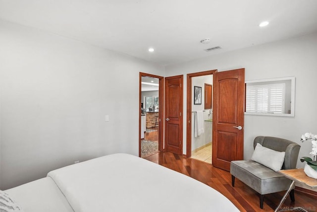 bedroom featuring wood-type flooring