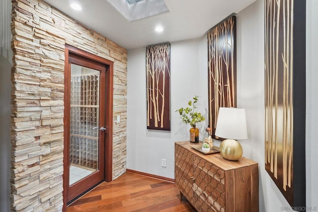 doorway featuring hardwood / wood-style flooring