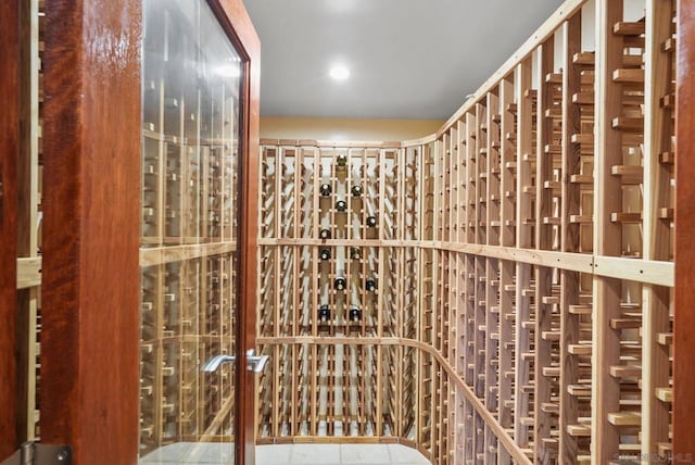 wine area featuring tile patterned flooring