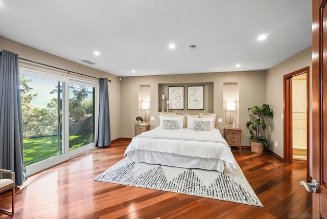 bedroom featuring access to outside and wood-type flooring