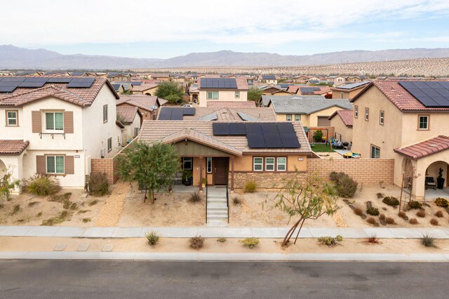 view of front facade featuring a mountain view