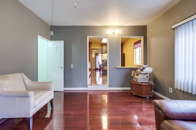 living area with wood-type flooring