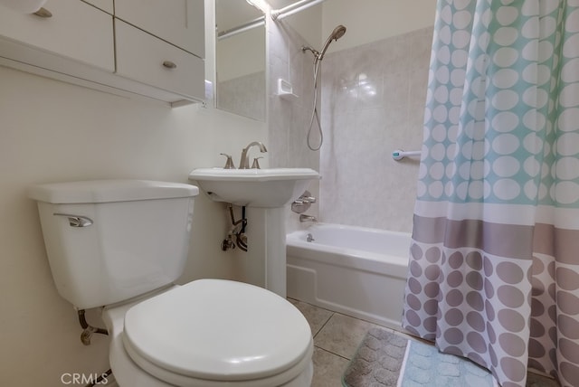 bathroom featuring toilet, shower / bath combination with curtain, and tile patterned floors