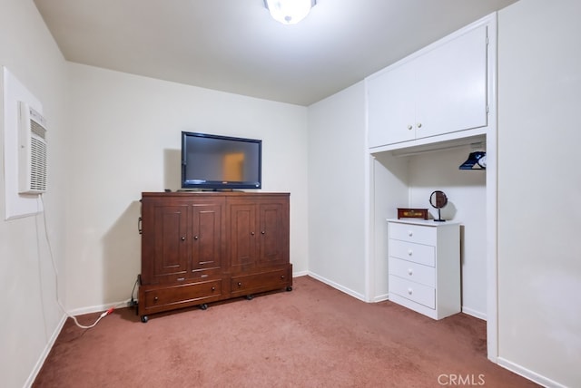 unfurnished bedroom featuring light carpet