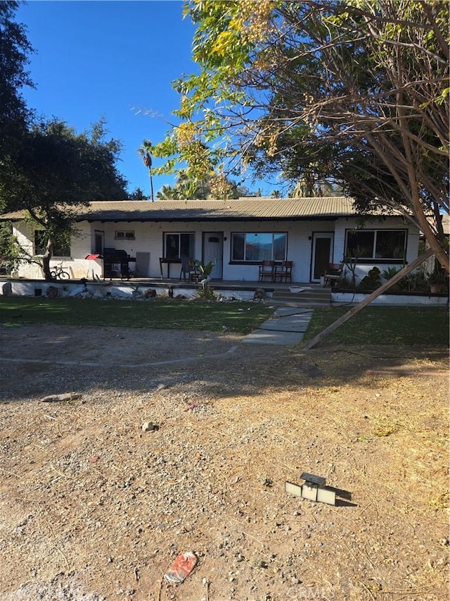 view of front of house with a patio