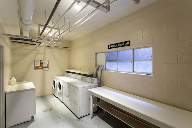 washroom with washer and clothes dryer