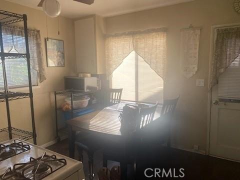 dining space featuring ceiling fan