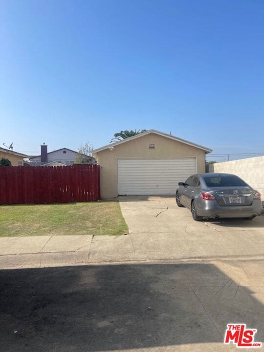 single story home with a garage