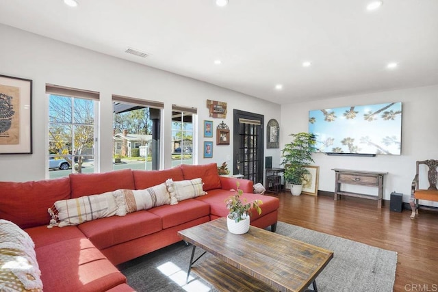 living room with dark wood-type flooring