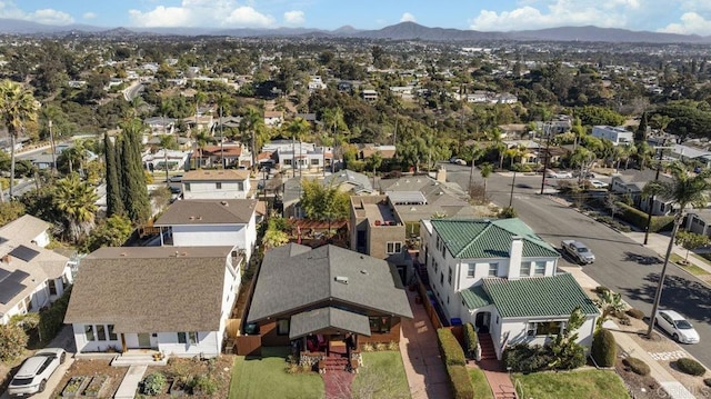 drone / aerial view featuring a mountain view