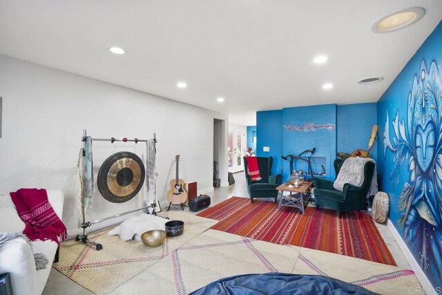 interior space with baseboards and recessed lighting