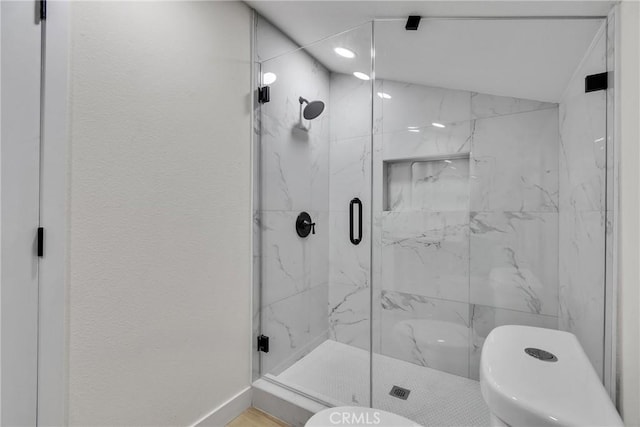 bathroom with walk in shower, vaulted ceiling, and toilet