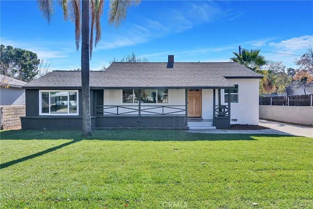 view of front of house featuring a front lawn and a porch