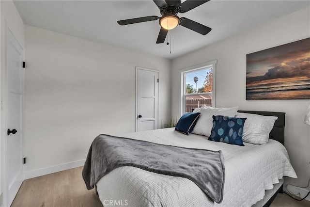 bedroom featuring ceiling fan and light wood-type flooring