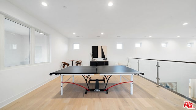 recreation room featuring light wood-type flooring