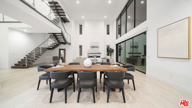 dining space with a high ceiling