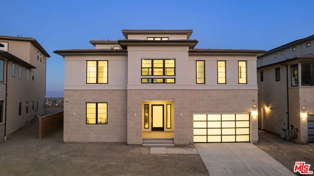 view of front of property with a garage