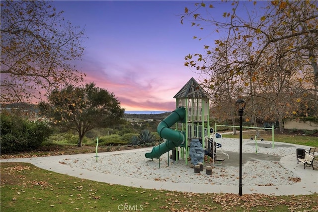 view of playground at dusk