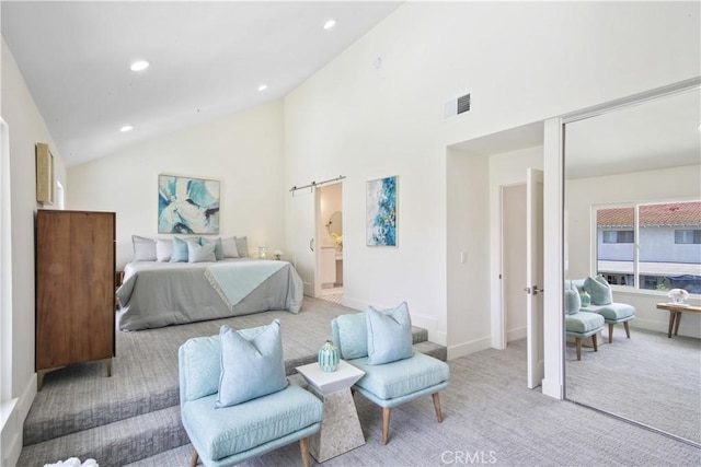 carpeted bedroom featuring high vaulted ceiling