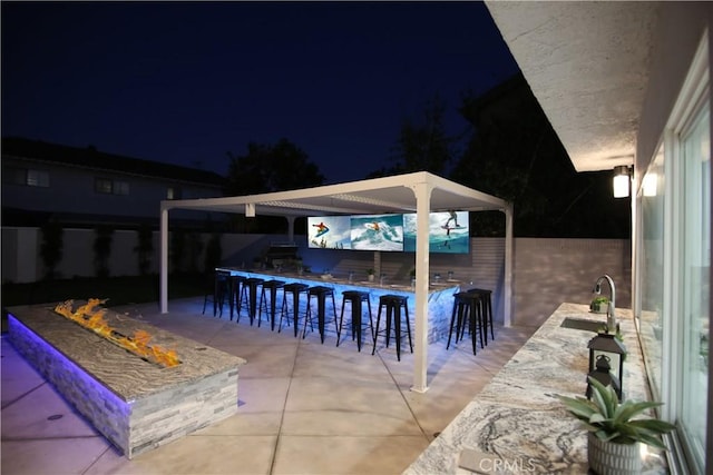 view of patio / terrace with a wet bar