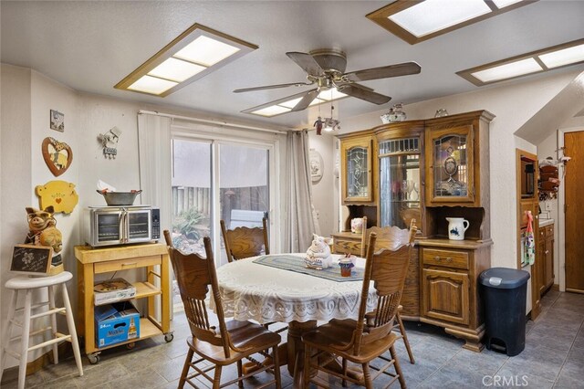 dining room with ceiling fan