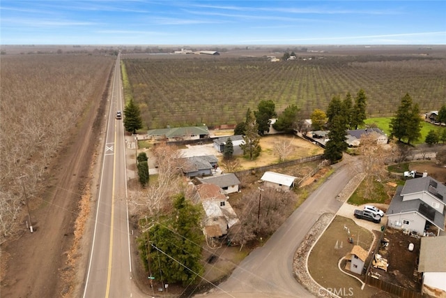 birds eye view of property featuring a rural view