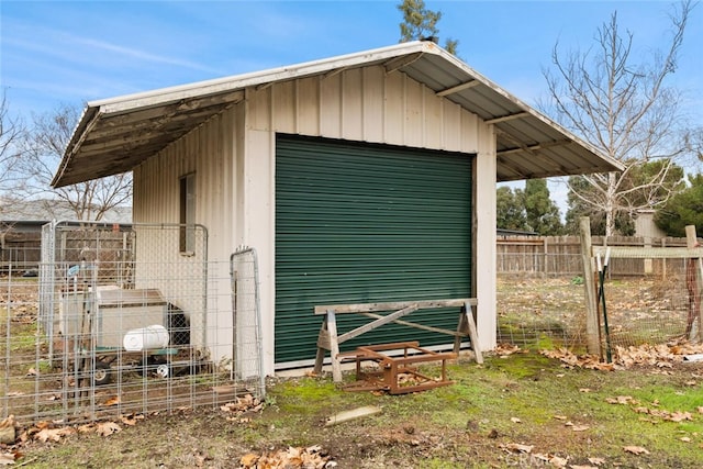 view of outbuilding featuring a garage