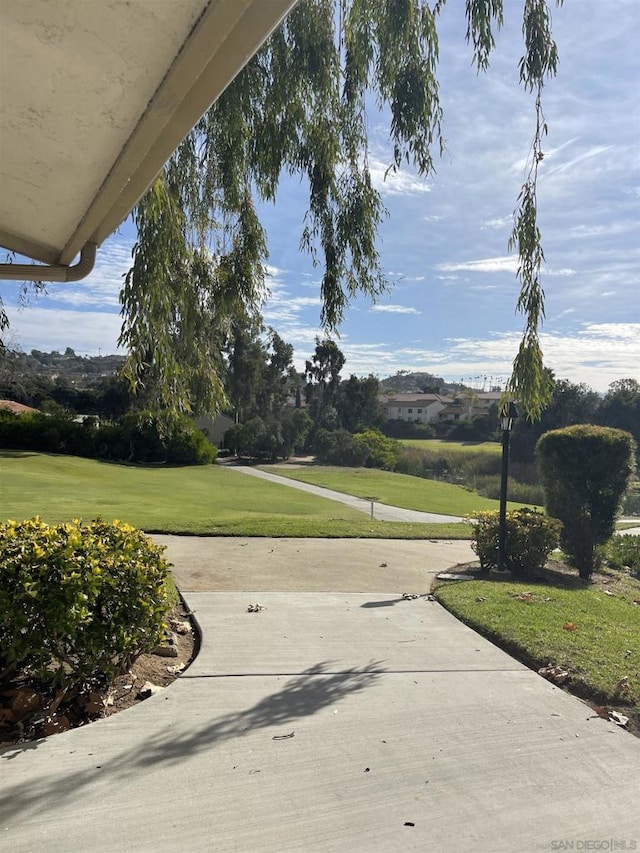 view of community featuring a yard