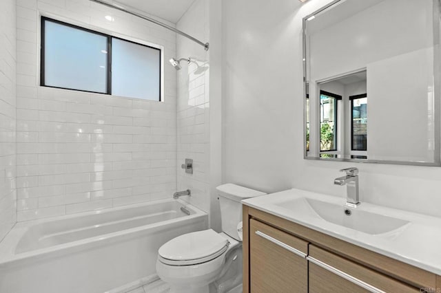 full bathroom featuring toilet, vanity, and shower / bathing tub combination