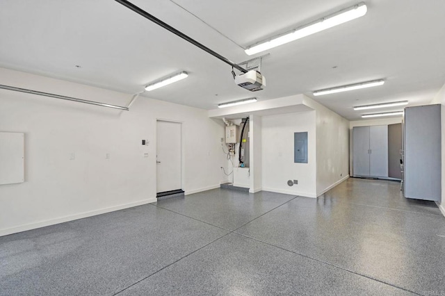 garage featuring a garage door opener and electric panel