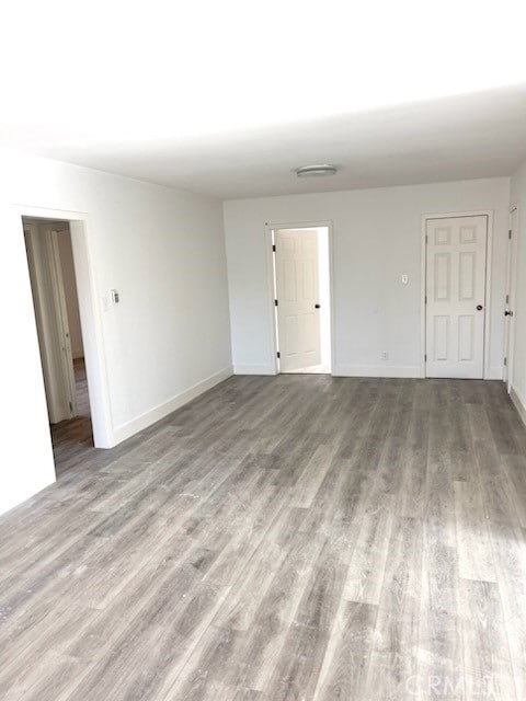 spare room featuring light hardwood / wood-style floors