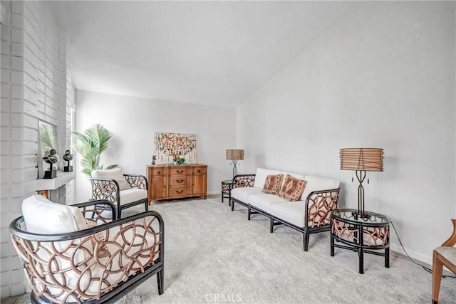 sitting room with carpet and baseboards